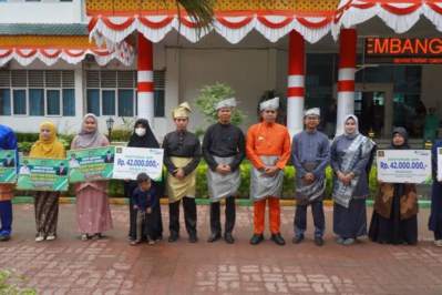 Pj Bupati Langkat Serahkan Santunan Jaminan kematian